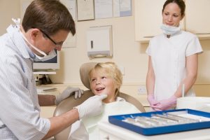 Child smiling on a dentist and as the header image of 